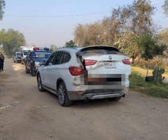 Hallan cadáver dentro de la cajuela de una camioneta de lujo en Mixquiahuala