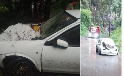 Roca cae de cerro aplasta un automóvil en carretera de Tlanchinol 