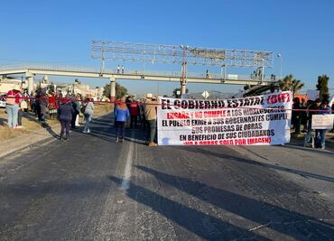 Fotos y video: Manifestantes bloquean bulevar Santa Catarina en Pachuca; policía dispersa la manifestación